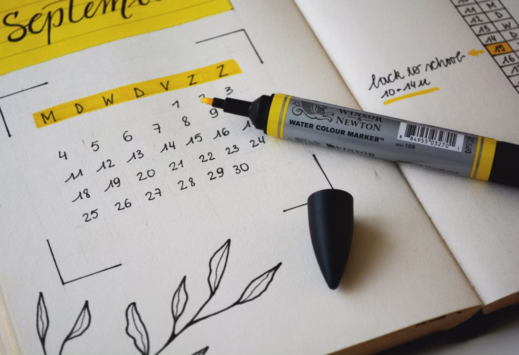 Event staff coordinating on-site with a laptop and notes to manage last minute event changes using a clear process and a single source of truth.